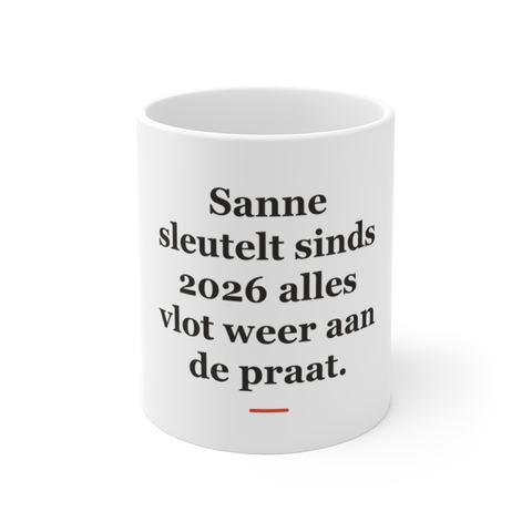 Mok met tekst “Sanne sleutelt sinds 2026 alles vlot weer aan de praat.” — cadeau voor een installateur